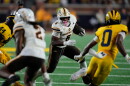 Western Michigan running back Jalen Buckley (6) runs the ball against Michigan during the second half of an NCAA college football game Saturday, Sept. 5, 2026, in Ann Arbor, Mich. (AP Photo/Paul Sancya)