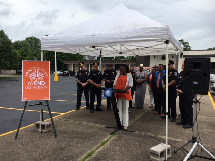 Mayor Warren speaking outside a former Wegmans site, where her grandfather was shot and wounded in 1984