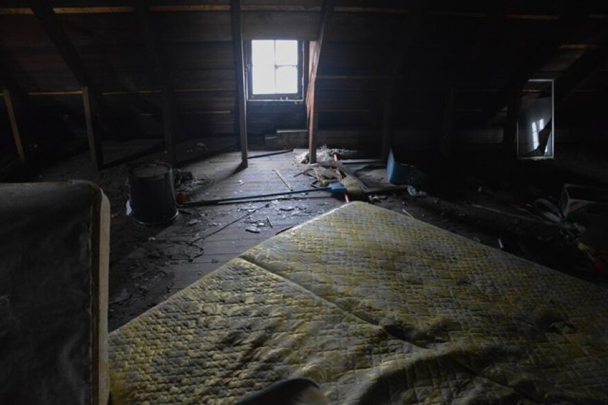 The attic of an abandoned house in Cleveland's Cudell neighborhood. (Nick Castele / ideastream)