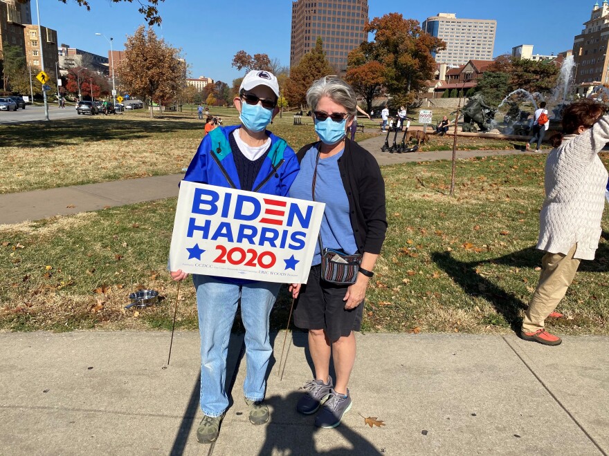 Overland Park residents Andrea Wickerham and her wife, Janet Justice, rushed to Mill Creek Park off the Plaza on Saturday to celebrate the AP calling the presidential race for Joe Biden.