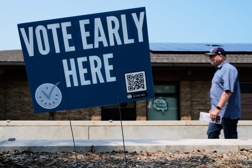 A voter walks to polling place in Milwaukee, Tuesday, July 28, 2026. (AP Photo/Nam Y. Huh)