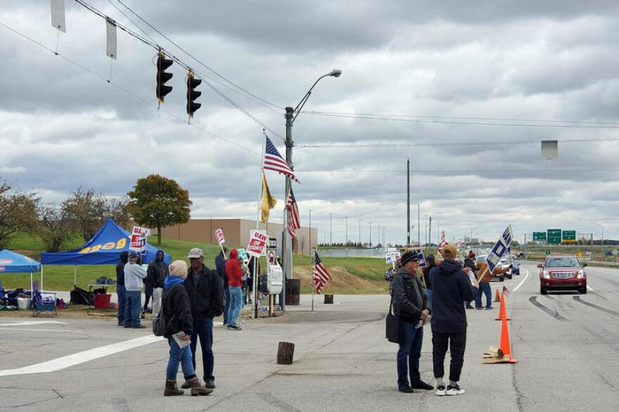 UAW members picket outside the GM Fort Wayne Assembly plant Thursday as they wait for word from the UAW National GM Council meeting in Detroit.