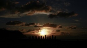 The sun rises behind moais statues on Ahu Tongariki, Rapa Nui, or Easter Island, early Thursday, Oct. 3, 2024.