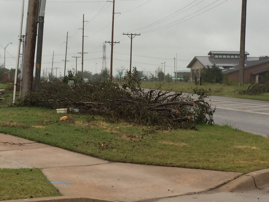 Storm debris piled along 36th Ave. NW just north of Tecumseh Road in Norman