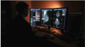 Dr. Benjamin Pettus analyzes a mammogram. (Image: Riverside Health System)