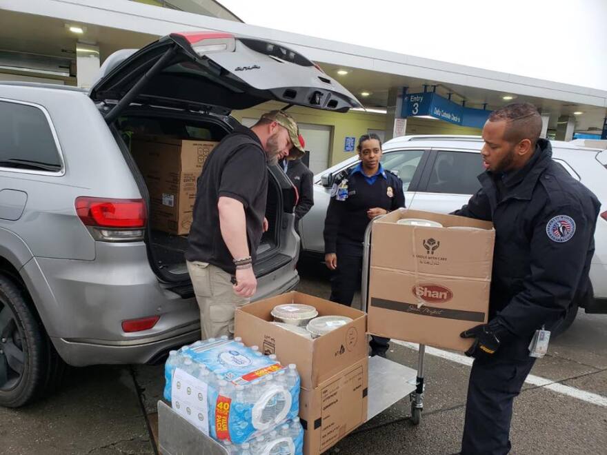 TSA workers receive lunch from the Islamic Foundation of Greater St. Louis during the partial government shutdown.