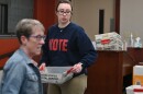 Interim Luzerne County Election Director Emily Cook carries mail-in ballots at Penn Place in Wilkes-Barre.