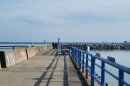 Visitors to Lake Michigan enjoy an afternoon on Milwaukee's breakwater. The city of Milwaukee is facing a fiscal cliff in 2025 due to pension obligations that could gut city services.