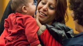 A refugee family from Iran arrives at SeaTac Airport in 2015