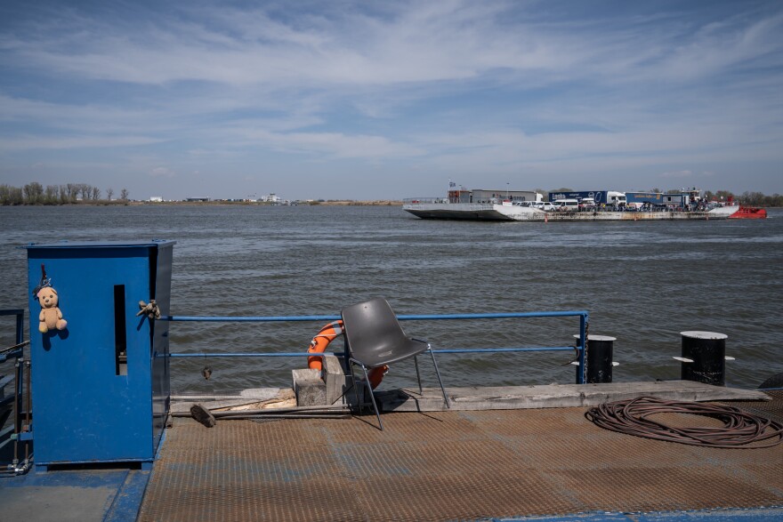 The ferry ride carrying Ukrainian refugees crossing the Danube into Romania takes about 20 minutes.