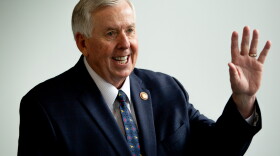 Missouri Gov. Mike Parson waves to the crowd on Tuesday, May 16, 2023, during a press conference at St. Louis Community College in Forest Park.