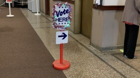 A sign in the Sangamon County building directing voters. 