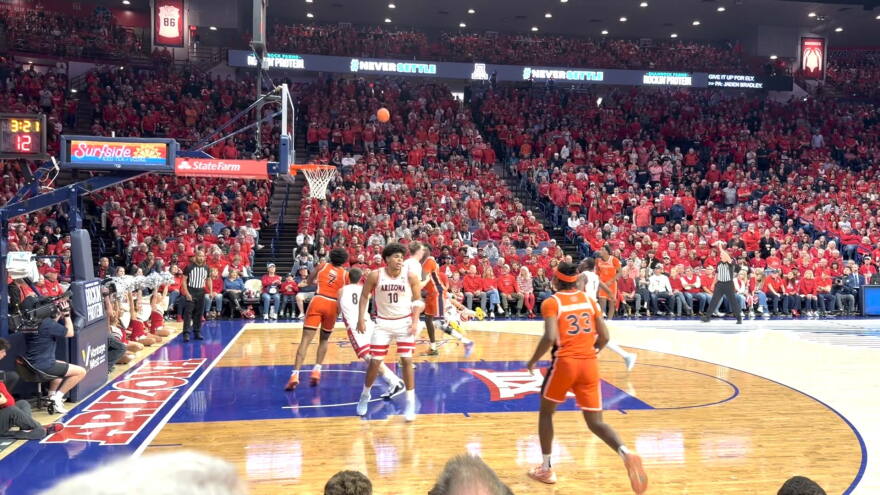 Arizona Auburn courtside hero