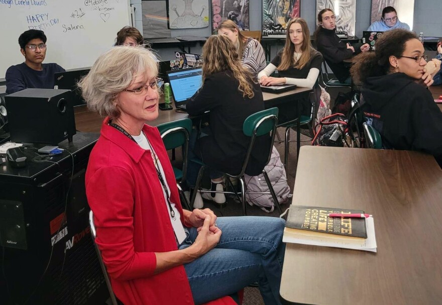 Fort Wayne school board trustee Anne Duff meets with students during a Rock The Vote! session.