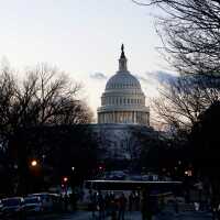 The U.S. Capitol is seen at sunrise on Wednesday, two weeks after it was stormed by a mob of pro-Trump extremists.