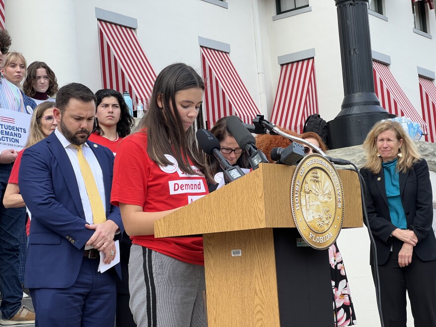 Florida State University student Alexis Dorman leads students and lawmakers in a moment of silence for the victims of the Marjory Stoneman Douglas High School shooting in 2018 and those killed in a recent mass shooting at Michigan State University during a press conference to speak out against permitless carry on Tuesday, Feb. 21, 2023.