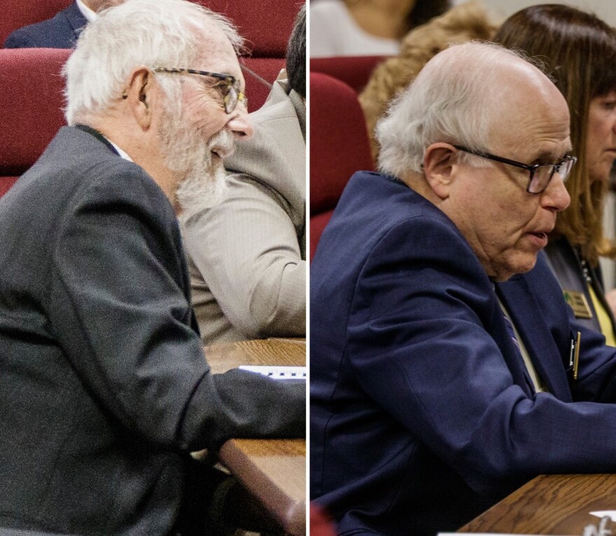 William Caisley and George Gordon seated at board meeting