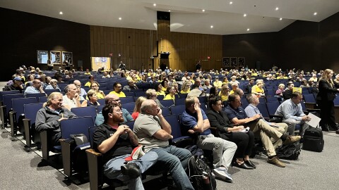 Hundreds of residents listen to testimony from a public health expert during a zoning hearing for a data center proposal in Archbald.