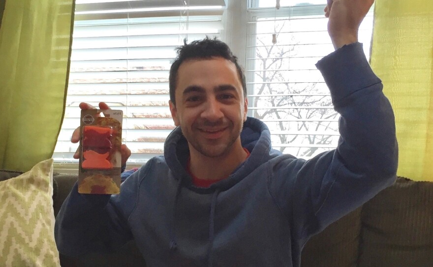 Adam Shokery shows off a set of taco holders his late mom gifted to him and his sister, Andrea Hayes.