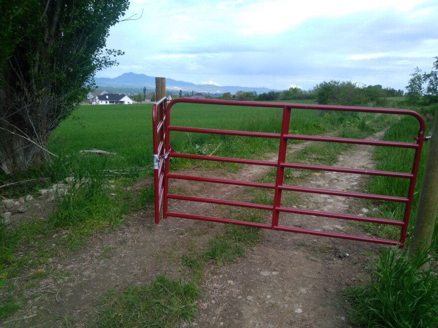 A gate blocks entry to the Upper Canal towpath between North Logan and Hyde Park.