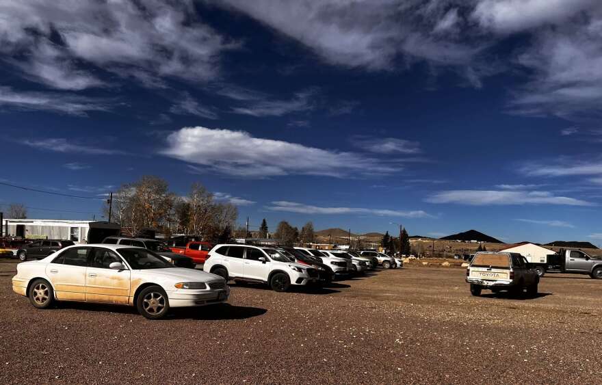 Over 20 vehicles are parked in Silver Cliff as folks wait in line for The Mobile Market food pantry.