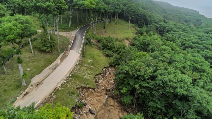 Water damage from flash flooding Monday, June 29, on M-119 near Lamkin Road.