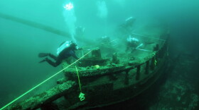 Maritime archaeologists exploring the "Christmas Tree" shipwreck in 2011.