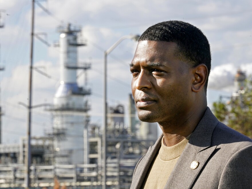 EPA Administrator Michael Regan stands near the Marathon Petroleum Refinery in Reserve, La., on Nov. 16, 2021. The Environmental Protection Agency on Thursday awarded grants for projects to monitor air quality in 37 states.