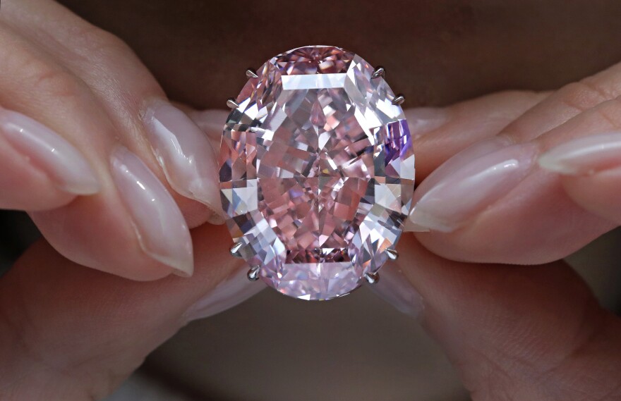 The Pink Star diamond, which fetched the highest price ever for a jewel offered at auction, is displayed at Sotheby's in Hong Kong on March 29.