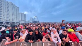 A crowd at Something in the Water eagerly awaits musical artists on Friday. (Image: Mike Diller)
