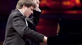Denis Evstuhin playing piano
