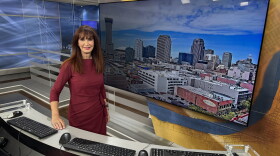Margaret Orr, WDSU TV chief meteorologist, stands inside the WDSU studio in New Orleans.