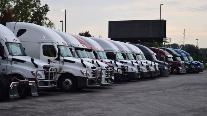 Semitrucks line up at a Kansas City truck stop in a region where nearly 1 in 10 workers hold transportation and material moving jobs.