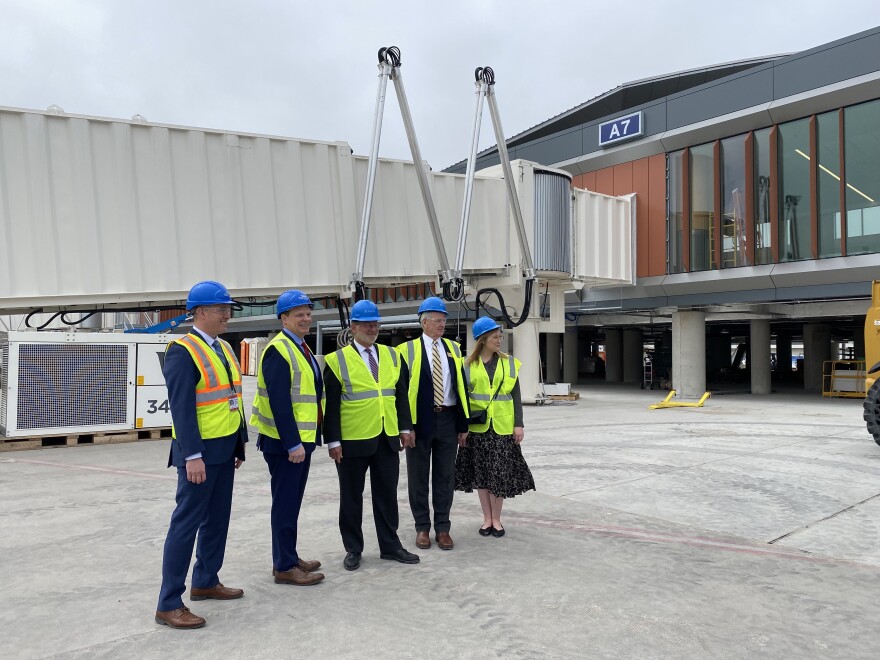 Michigan Sen. Gary Peters (center) visited the Gerald R. Ford International Airport on April 28. Peters helped secure nearly $10 million in federal funds to support the airports expansion of its Countercourse A.