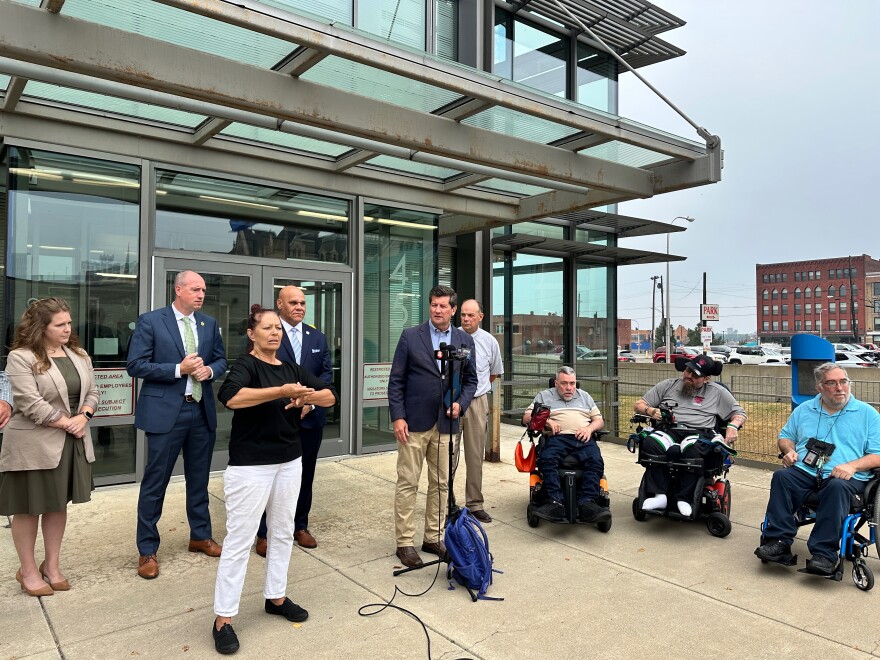 Erie County officials and disability advocates announcing changes to the "Handle with Care" registry outside of Central Police Services in downtown Buffalo on July 31, 2025.