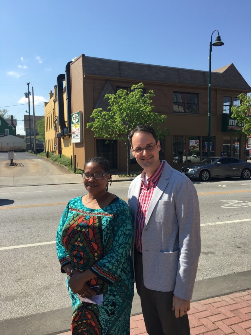 Cleveland LGBT Center Executive Director Phyllis Harris and Board President Bryan Bowser in front of the Detroit Avenue building that will be razed to make room for the new center.