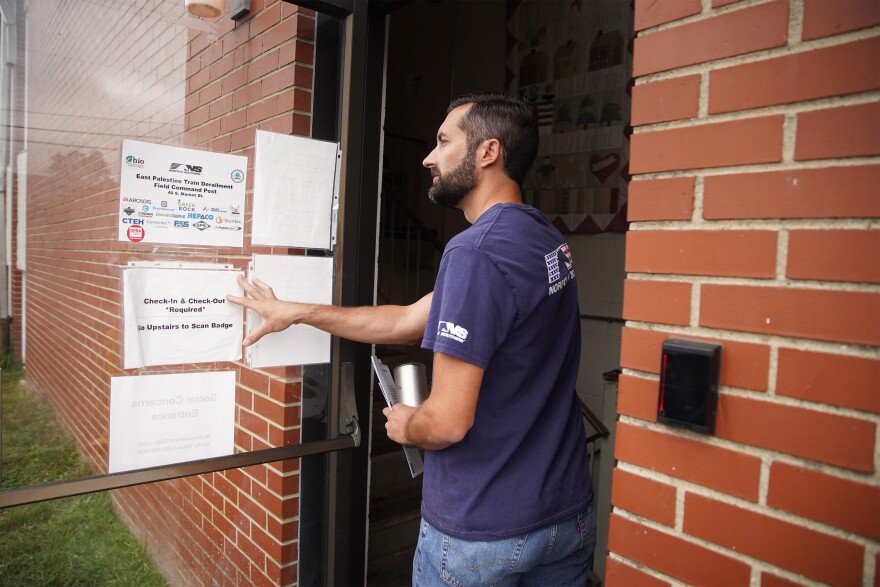 Jeremy Vranesevich, Norfolk Southern’s community liaison in East Palestine, enters Centenary United Methodist Church on Monday, Sept. 25, 2023.