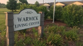 sign for warwick living center