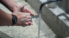 Stock photo of someone washing their hands