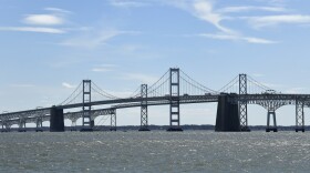 The Chesapeake Bay Bridge stands near Annapolis, Md., April 3, 2020. America’s roads are a lot less congested, due to coronavirus shutdowns that have kept millions of commuters, shoppers and vacationers parked at their homes. While that makes it easier to patch potholes, it also could spell trouble for road and bridge projects, as revenue from tolls, fuel taxes and other user fees declines. A westbound lane of the Chesapeake Bay Bridge recently re-opened to vehicles following repairs. The $27 million project was completed well ahead of schedule, partly because of light traffic amid the coronavirus pandemic. (AP Photo/Susan Walsh)