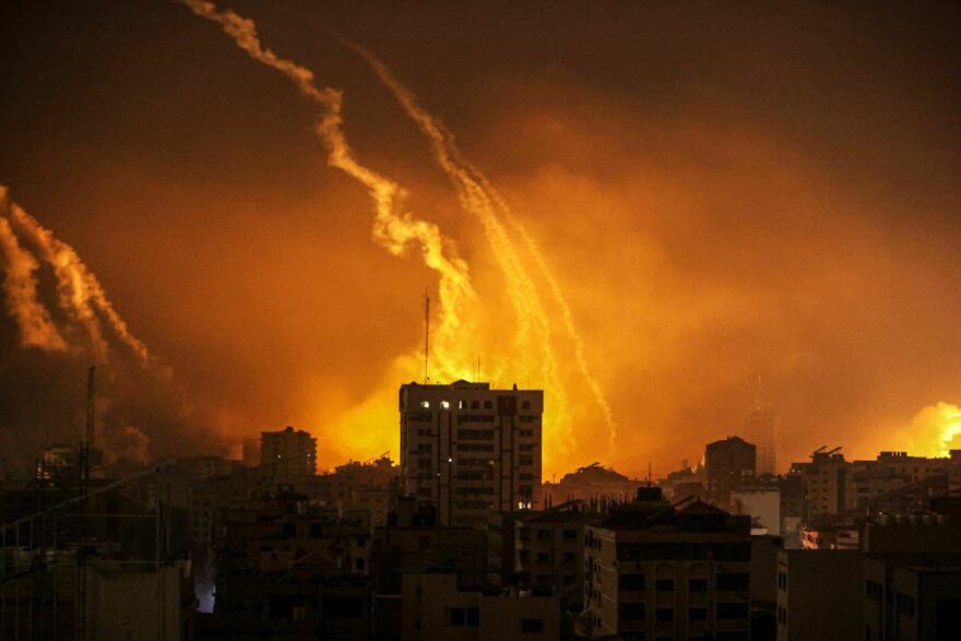 Smoke rises and billows in the Gaza Strip as the Israeli army conducts air attacks early Saturday local time.