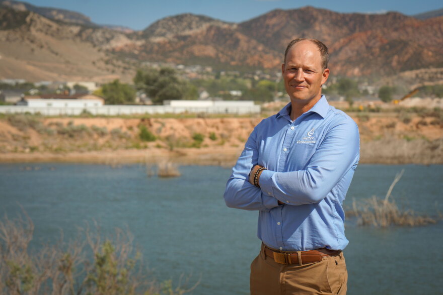 Cedar Valley Water Conservancy District's Paul Monroe stands in front of an aquifer recharge basin in Cedar City, July 2, 2026