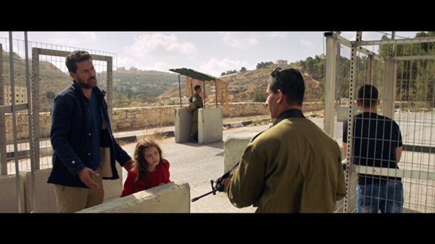 A screenshot from the narrative film "The Present."