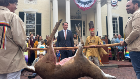 Governor Glenn Youngkin and Mattaponi Chief Mark Falling Star Custalow participate in the 348th Virginia Thanksgiving Tribute ceremony
