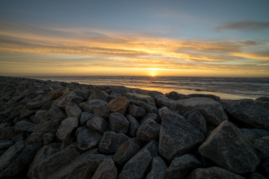 Sunset over the seawall in Shishmaref, Alaska. 