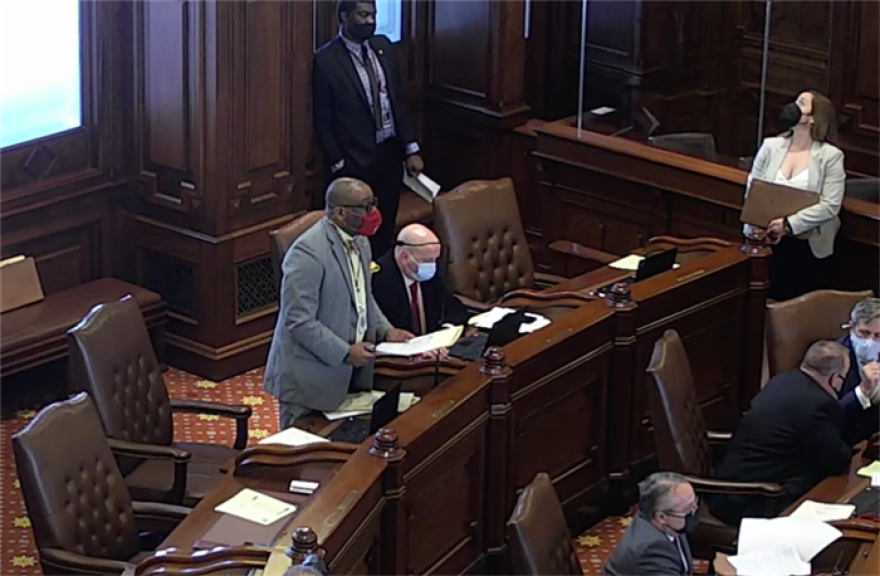 State Sen. Christopher Belt, D-Swansea, speaks on the Senate floor Tuesday in favor of his bill to require all shelters that provide temporary housing assistance to women and youth to make available products such as sanitary napkins, tampons and panty liners, provided there is money in the budget to do so.