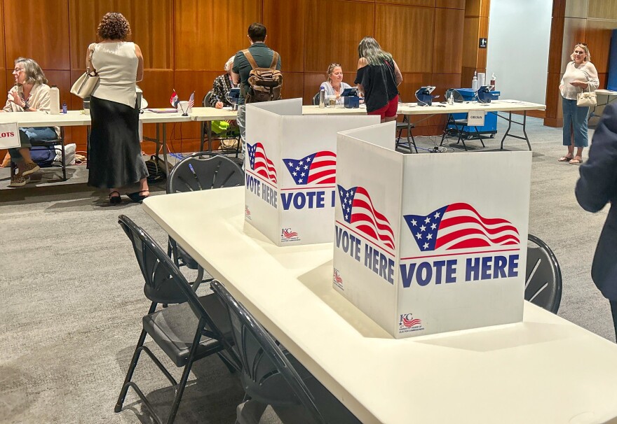 Voters cast their ballot in the 2026 Missouri primary elections at the National WWl Museum & Memorial on August 4, 2026.