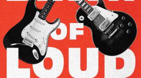 Book Cover - The Birth of Loud, red background with two guitars and the title of the book in large white letters