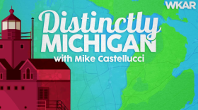 A light house and map of Michigan
