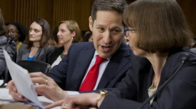 Centers for Disease Control and Prevention Director Tom Frieden, left, confers with State Department Bureau of Oceans and International Environmental and Scientific Affairs Acting Assistant Secretary Judith Garber, on Capitol Hill in Washington, Wednesday, July 13, 2016, as they wait to testify before the Senate Foreign Relations subcommittee hearing on the "Zika in the Western Hemisphere: Risks and response." (Manuel Balce Ceneta/AP)
